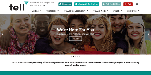 TELL Japan's current website features an image slider in the hero section. The first image displays a diverse group of smiling people clustered together, accompanied by the title We're Here For You. The second image depicts two men having counselling, with the title TELL Counselling. The last image shows a woman wearing headphones and a microphone, resembling a support agent, with the title Support Worker Training.